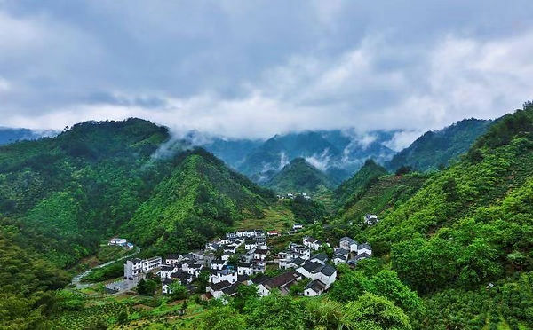 A Village in Huizhou Surrounded by Grand Mountains