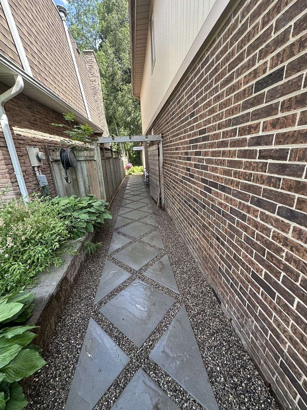 High angle view of a diamond walkway leading to a residential property