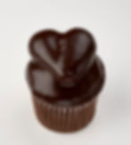 Our rich devil’s food cake stuffed with vanilla buttercream then topped with buttercream pillows and dipped in our homemade ganache.