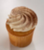 Coffee soaked vanilla wafer below our moist vanilla cake, stuffed with espresso buttercream, topped with vanilla buttercream, then dusted with cocoa and espresso powder.