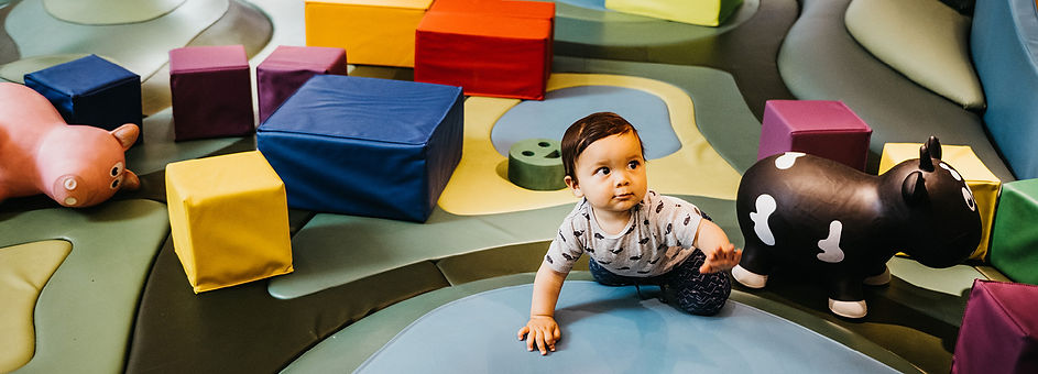 Toddler exploring Crawl, Climb & Grow