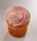 Shortbread cookie bottom below our strawberry cake topped with strawberry cream cheese frosting.