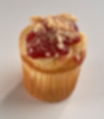 Our rich yellow cake with a creamy cheesecake filling baked in, then topped with strawberries and a shortbread crumble.