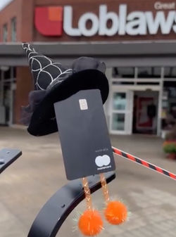 A PC Finanicial card on a Halloween shopping spree