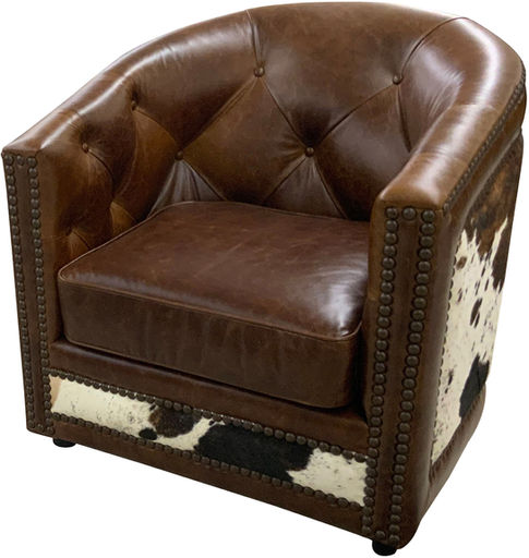 Rustic western and mountain style leather swivel chair with cowhide accent.