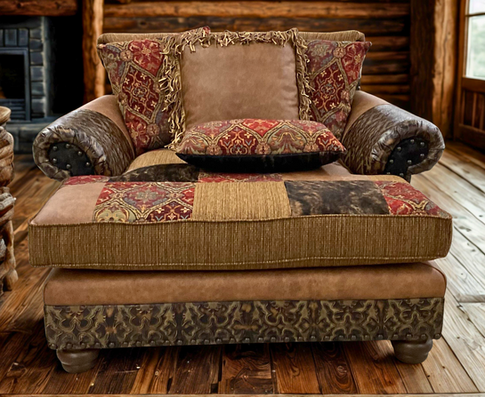 Rustic western and mountain style leather chaise with fabric, embossed leather and cowhide accent.