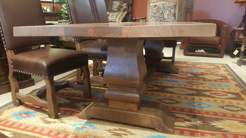 Handcrafted solid wood rustic western and mountain style custom dining table base.