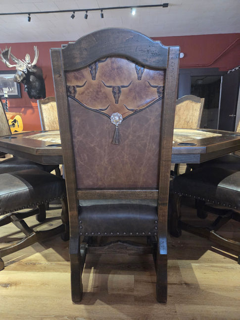 Custom handcrafted solid wood rustic western and mountain style poker table and chairs. Genuine cowhide on table top.