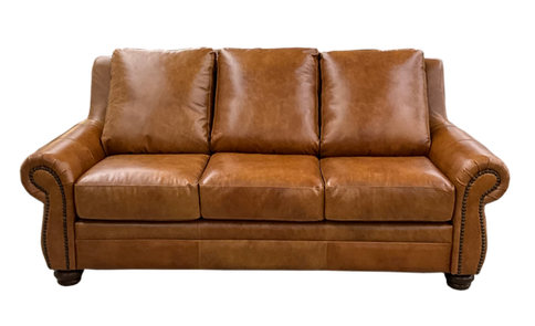 Rustic western and mountain style top grain leather sofa.