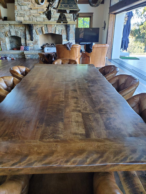 Handcrafted solid wood rustic western and mountain style custom dining table.