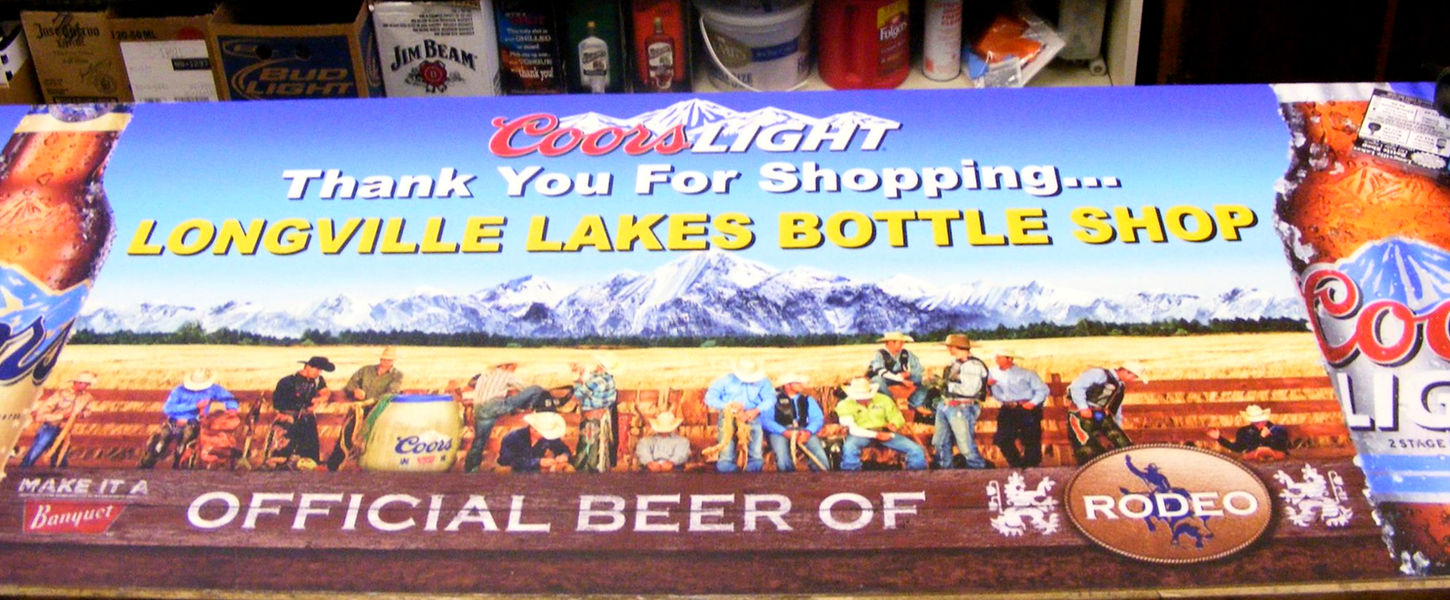 Coors Light sign: Longville Lakes Bottle Shop