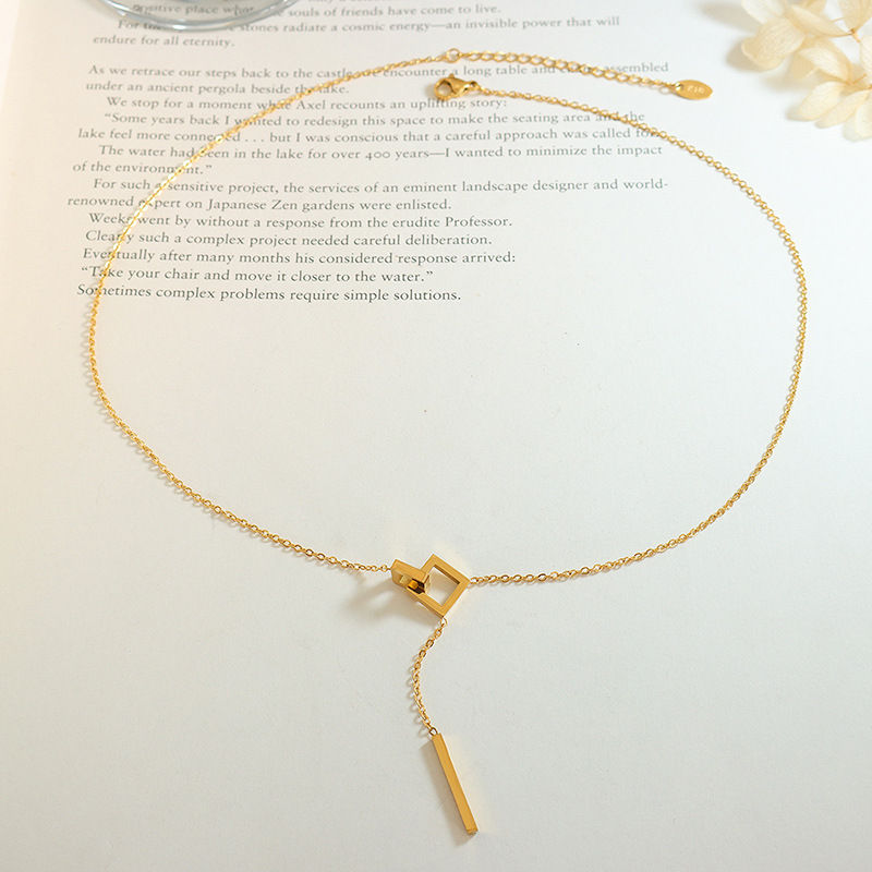 Thumbnail: Gold Y-shaped double square tassel necklace