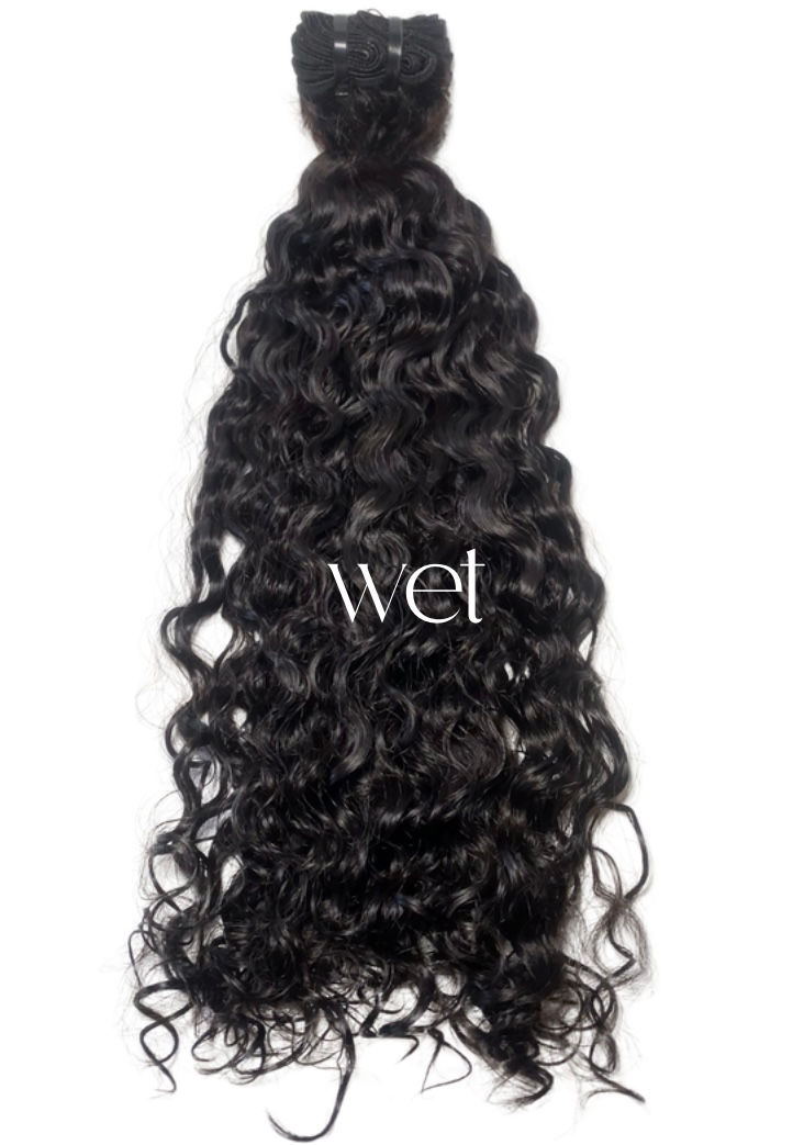 Thumbnail: Raw Burmese Curly hair shown wet to reveal defined curls and natural texture.