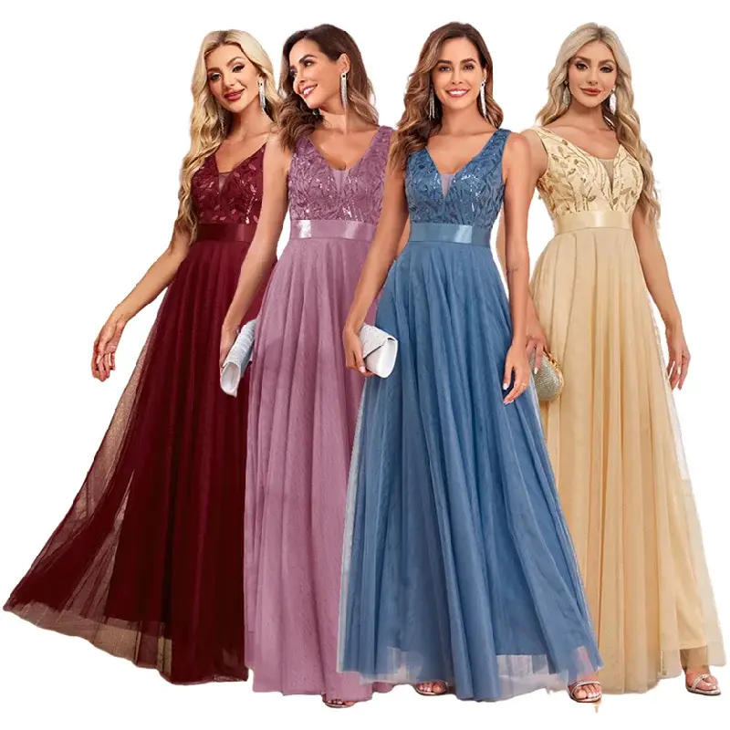 Four women wearing long sleeveless lace-trimmed bridesmaid dresses in burgundy, mauve, blue, and champagne, posing together.