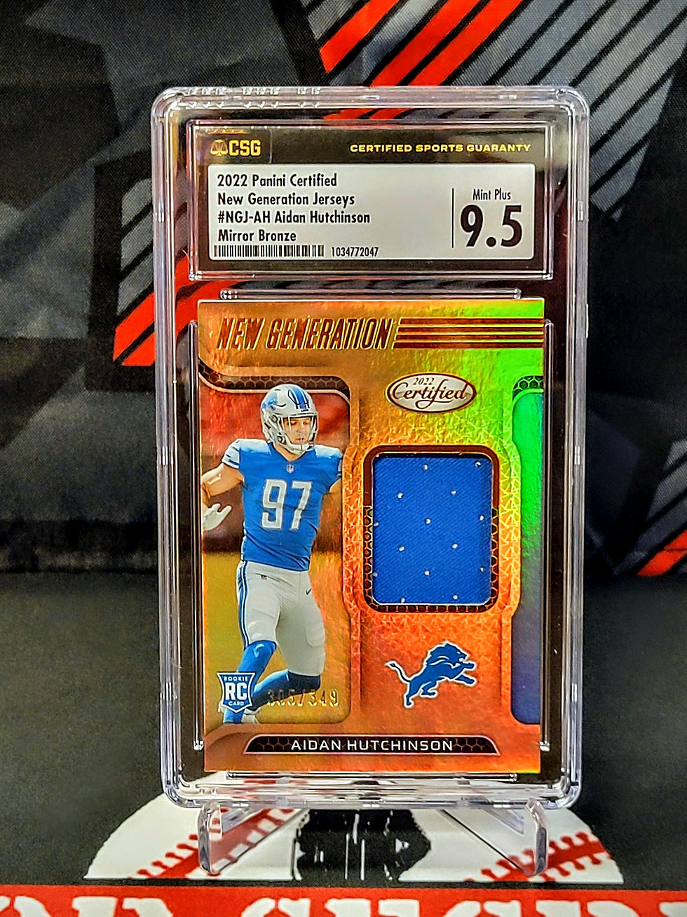 Aidan Hutchinson Lions #NGJ-JH Certified Bronze Patch /349 Graded - CSG 9.5