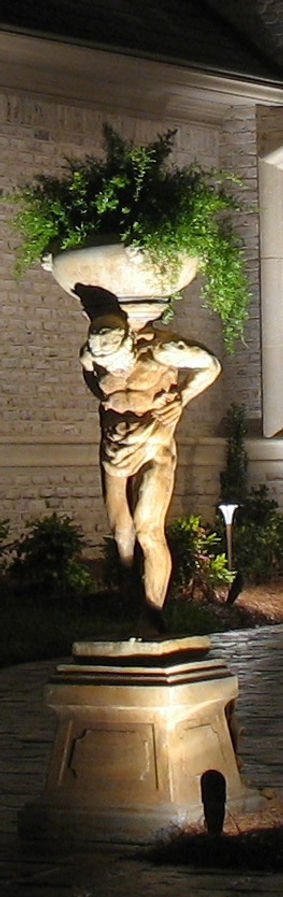 Statue planter with bullet light