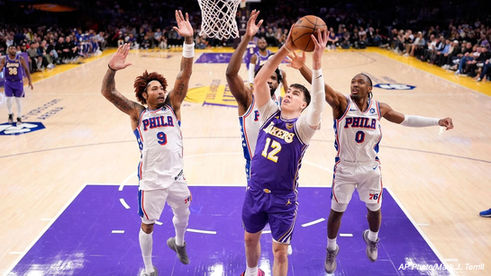 Austin Reaves Scores 35 to Lead Lakers to 119 to 115 Victory Over 76ers Amid Doncic Injury