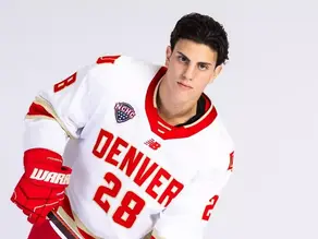 Denver defenseman Zeev Buium, aged 19, has officially signed a contract with the Minnesota Wild.