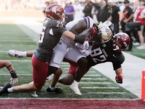 Demond Williams Jr. Leads Washington to Commanding Apple Cup Victory Over Washington State, 59-24