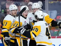 Penguins Cruise Past Flyers 7-0 as Malkin Scores and Silovs Records Shutout.