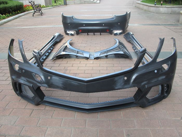 Thumbnail: MB 10-13' W207 E-CLASS WALD STYLE FRONT BUMPER W/LED LAMP