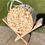 Miniaturbild: Holzkrippe mit Anzündholz im Ring
