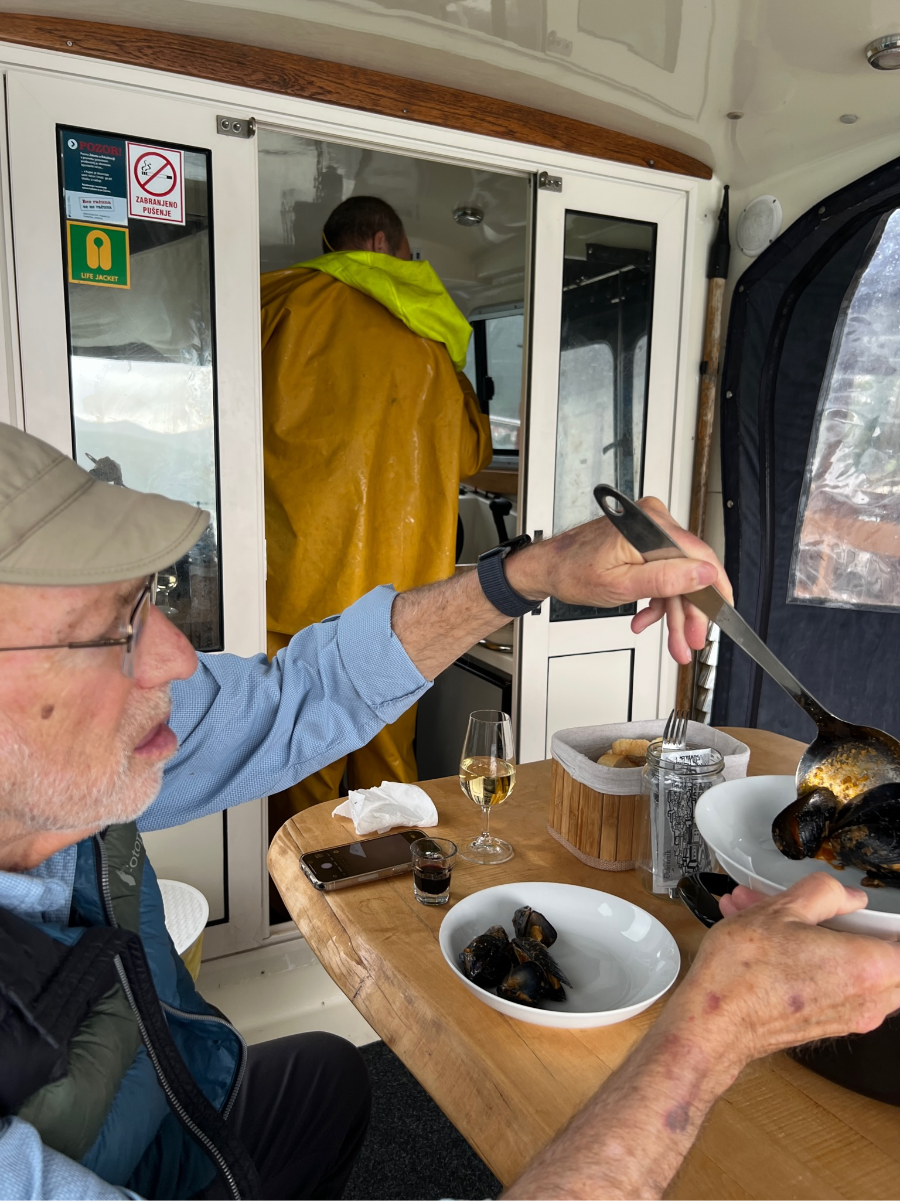 Oyster & Mussels Experience: "Ted and Margaret savoring fresh oysters in Mali Ston, a culinary highlight of their Balkan adventure."