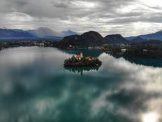 Traditional Pletna boat on Lake Bled, a unique experience on our private Zagreb Ljubljana taxi with stop on Bled Lake