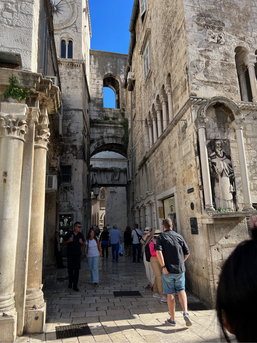 Diocletian's Palace Courtyard: "The sprawling courtyard of Diocletian's Palace in Split, a living monument to Roman architecture and history."