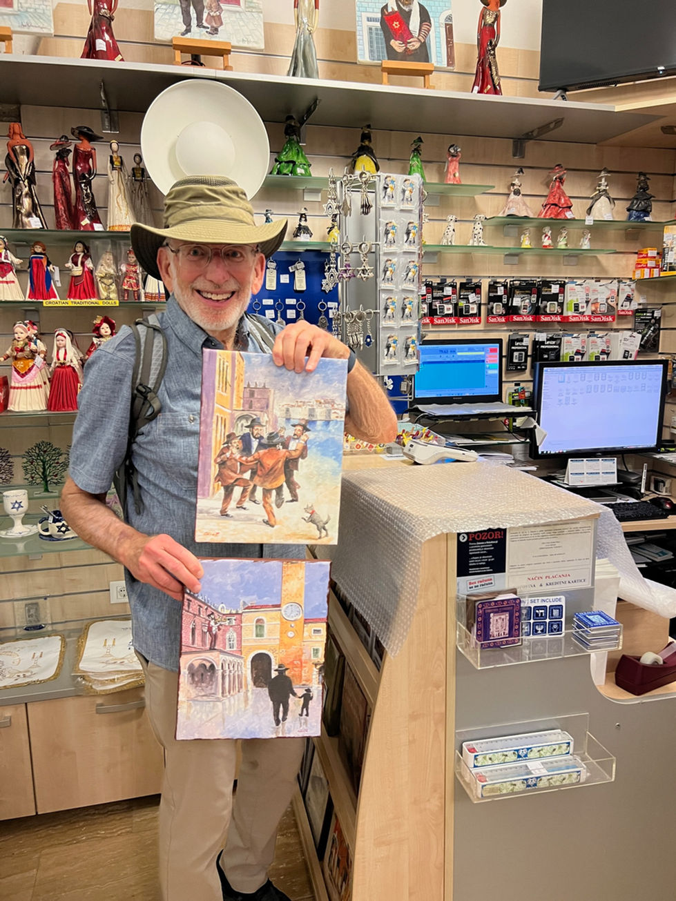 Buying some paintings from local artists in Dubrovnik