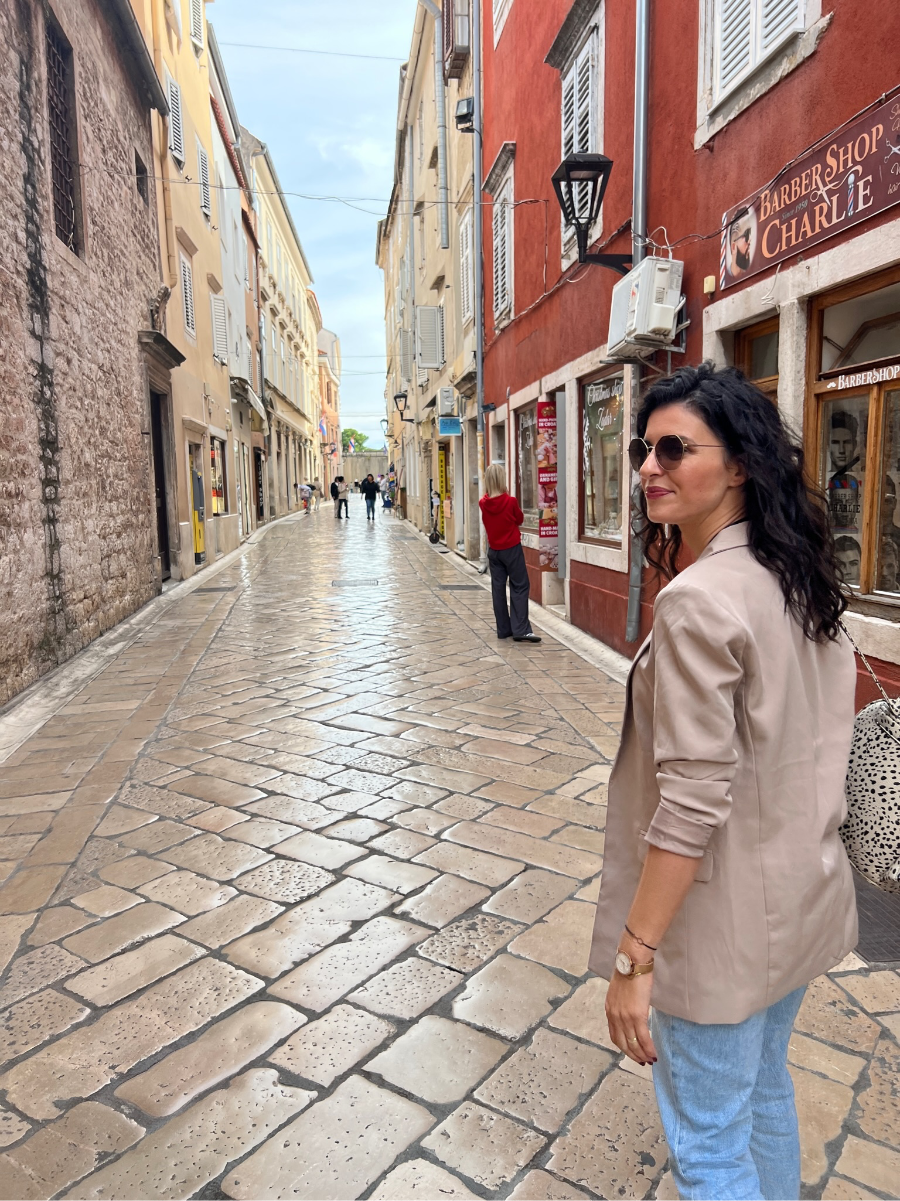 Narrow Alleys of Zadar’s Old Town: "Wandering through the narrow, cobblestone alleys of Zadar's Old Town, lined with quaint shops and cafes."