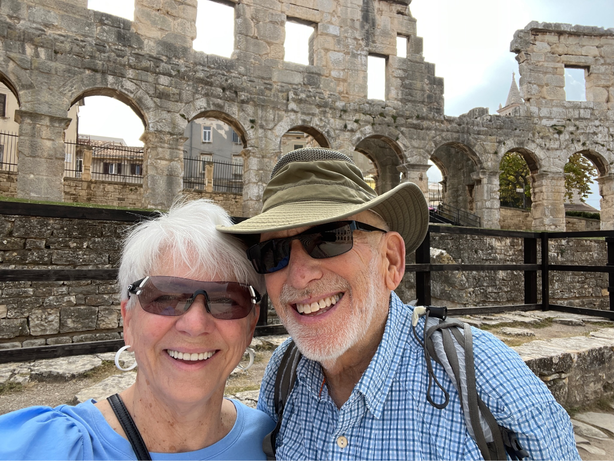 Exploring Pula’s Roman Amphitheater: "Ted and Margaret marveling at the grandeur of Pula's ancient Roman amphitheater, a testament to the city’s rich history."