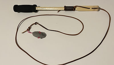 Cat Teaser Wand from TexasToolshed.com, with a comforting soft handle grip, made of natural Bamboo and leather to maintain your cats wellness and happiness making fun a priority exercise.