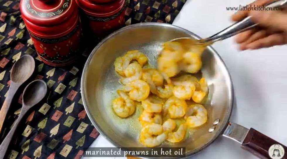 fry the marinated prawns