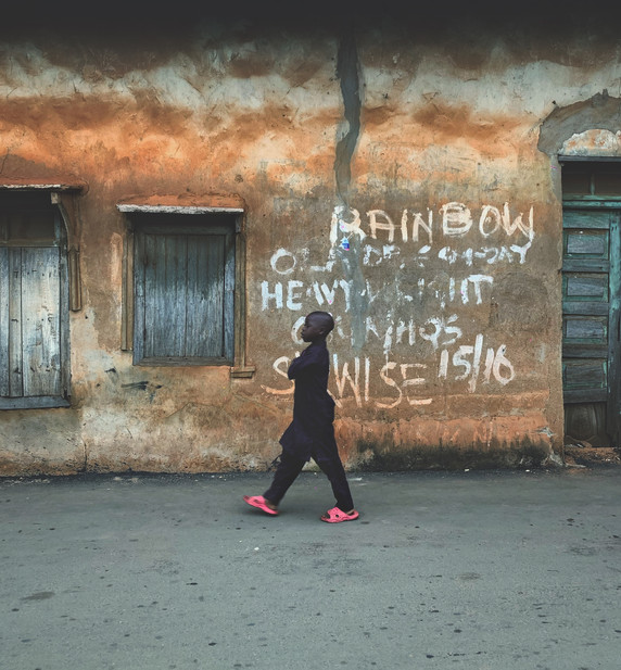 Boy and wall - Offa, Kwara State