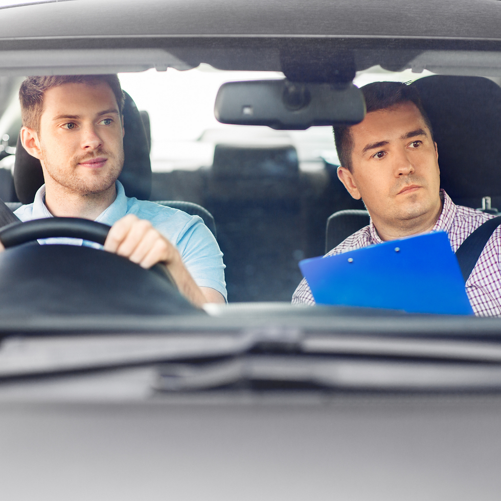 Close-up view of a driving instructor explaining road signs to a learner