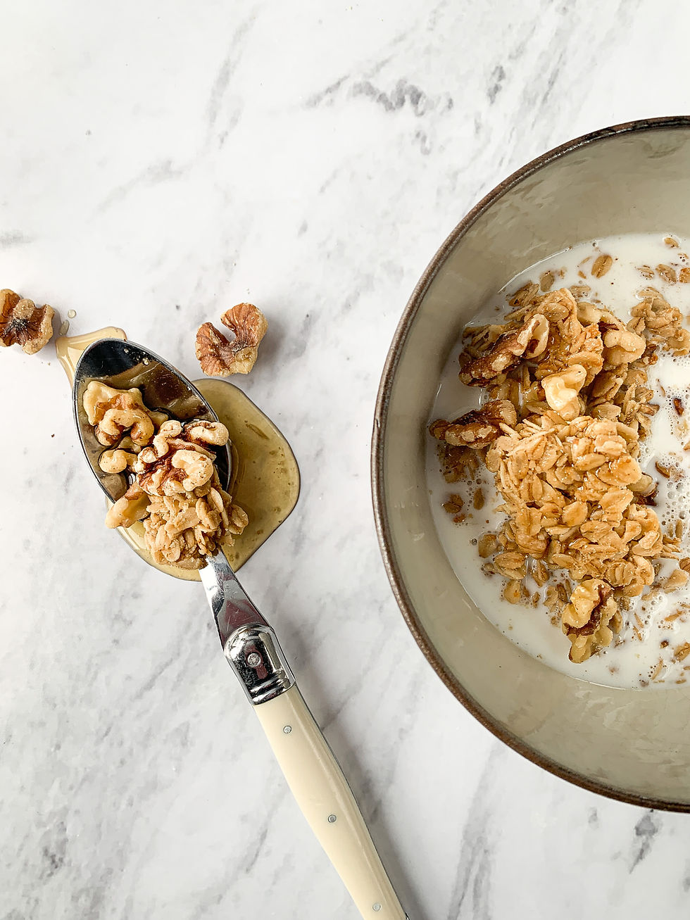 Thumbnail: Maple Walnut granola in bowl a bowl of milk