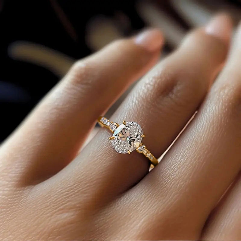 Thumbnail: The Oval Opulence: Luxury Three-Stone Pave Ring