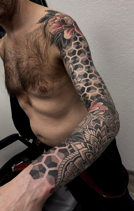 graphic tattoo sleeve mens arm