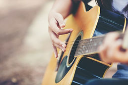 portrait-beautiful-girl-playing-guitar-with-bike-nature_1150-12842.jpg