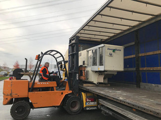 Dismantling, loading and transporting plastic injection molding machines from Germany to Poland