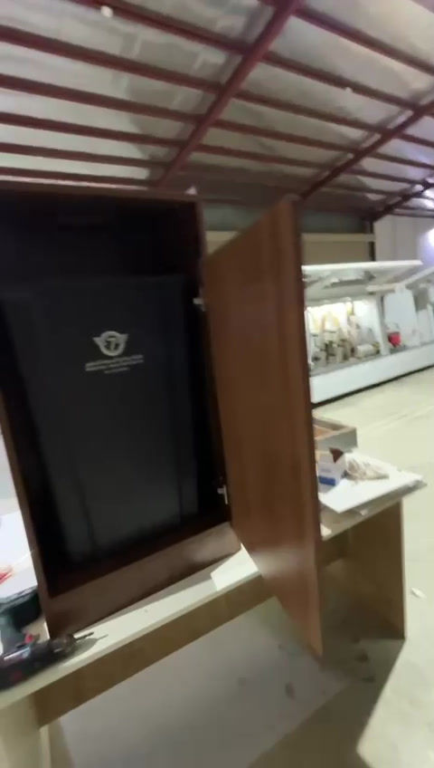 Demonstration of a wooden garbage bag cabinet showing size, compartments, and waste bag placement – practical solution for ho