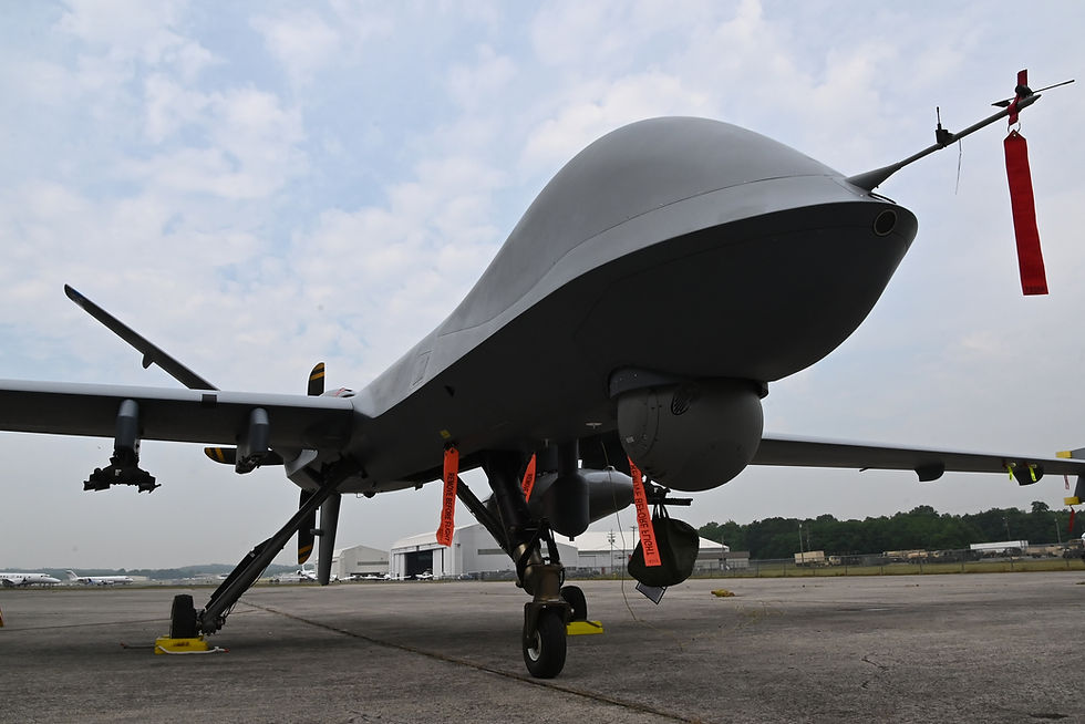 Large military unmanned aerial vehicle on runway at airbase