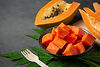 fresh-papaya-cut-into-pieces-put-black-plate_edited.jpg