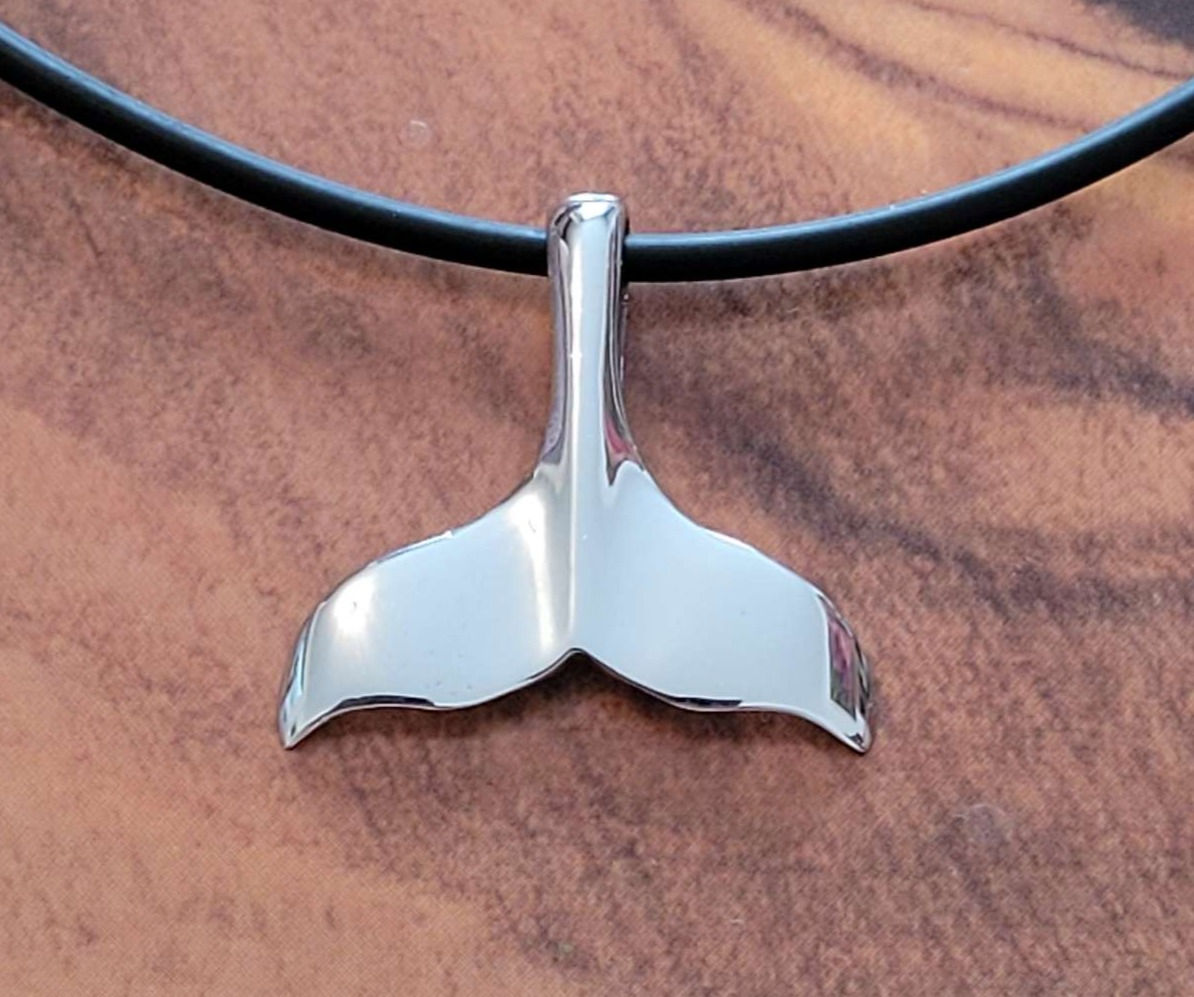 Sterling silver Whale tail , this is a southern right Whale tail