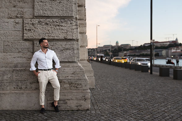 Founder of Budapest Wellness Concierge in Budapest by the Danube river, representing premium wellness travel experiences