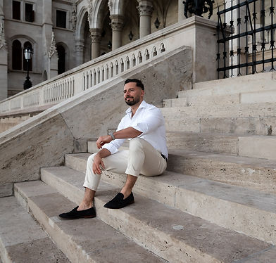 Founder of Budapest Wellness Concierge sitting in Budapest, providing tailored wellness and treatment experiences
