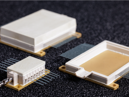 Close-up view of RJR photonics packages displaying various configurations, showcasing the intricacy and sophistication of advanced optical communication components.