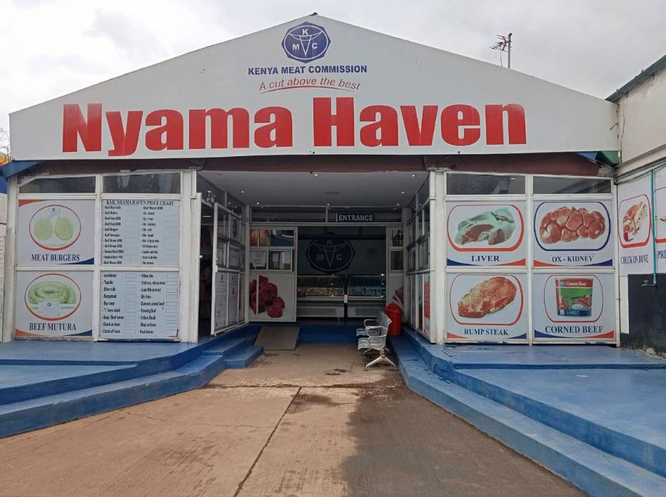 Nyama Haven storefront with large red sign, featuring images of meat products like liver and rump steak. Blue and white color scheme.