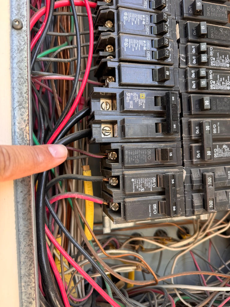 Double tapped breaker found during home inspection electrical panel in Riverside Southern California